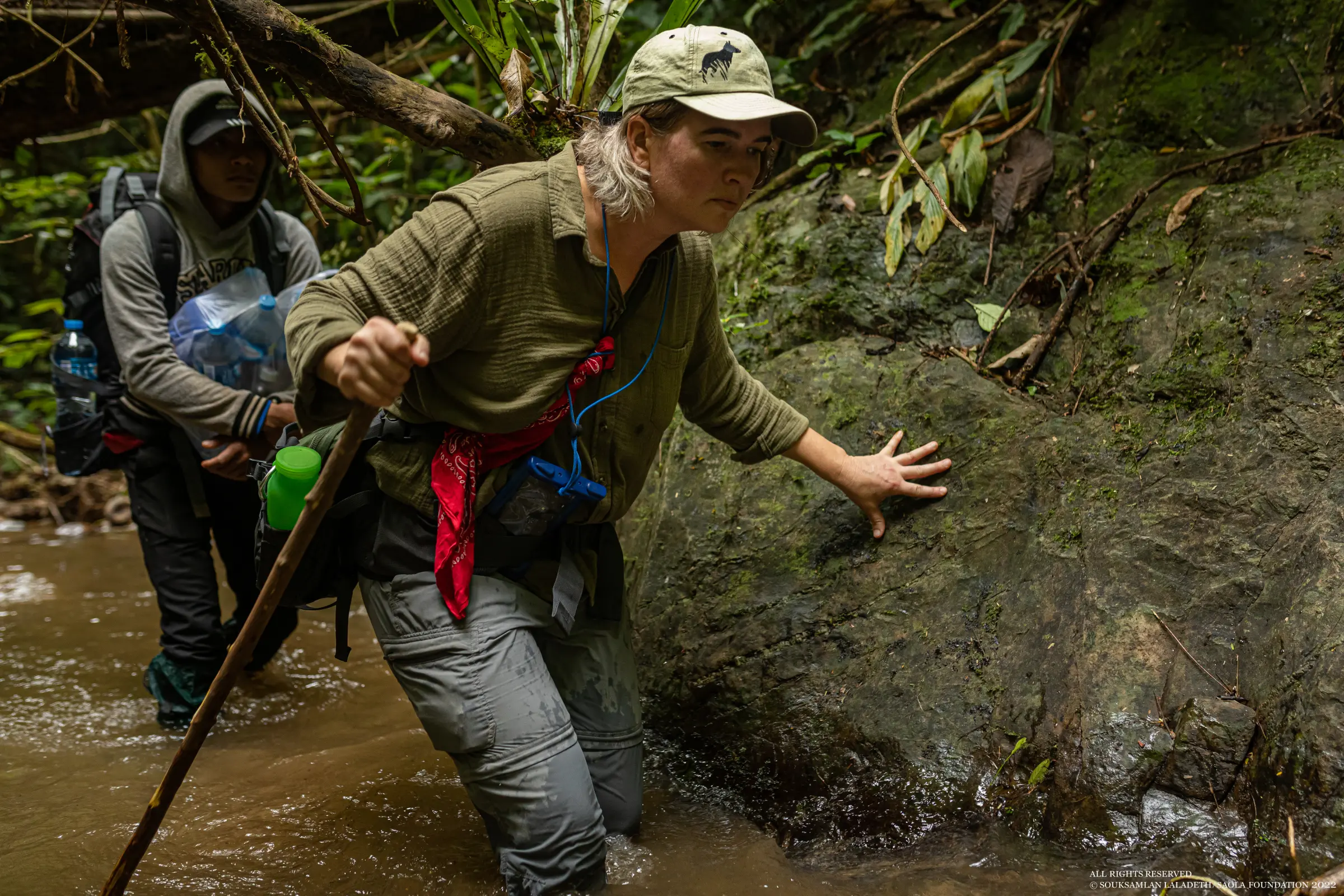 Aimee traveling through the Annamites with the Saola Foundation team along rivers and difficult terrain.